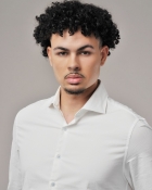 MALIK S.