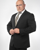 DEAN M.