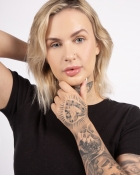 NICOLE V.
